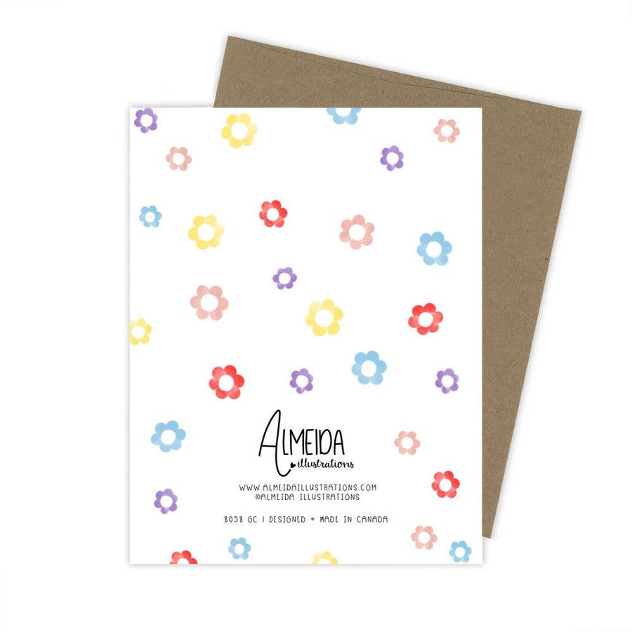 Back of a greeting card with a kraft paper envelope, featuring a scattered pattern of colorful watercolor flowers and the Almeida Illustrations logo.