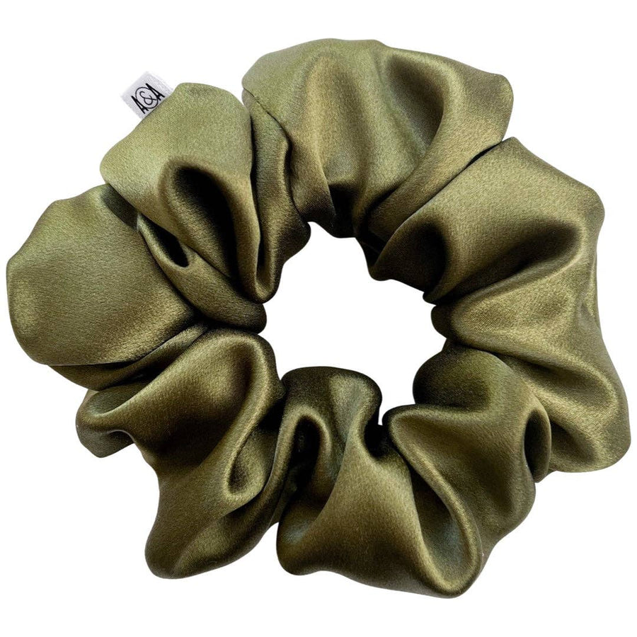 An olive green silk scrunchie.