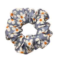 Thumbnail for Light Blue Scunchie and a repeating pattern of white daisy flowers with bright orange centers.