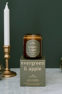 Thumbnail for An amber jar candle labeled 