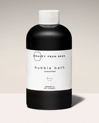 Thumbnail for 
A close-up of a small, black bottle of 