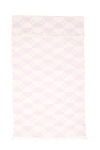 Thumbnail for A full-length vertical view of the lilac and cream geometric Phase towel. The top edge is folded over to show the reversible nature of the jacquard pattern, with hand-tied tassels visible on both ends.