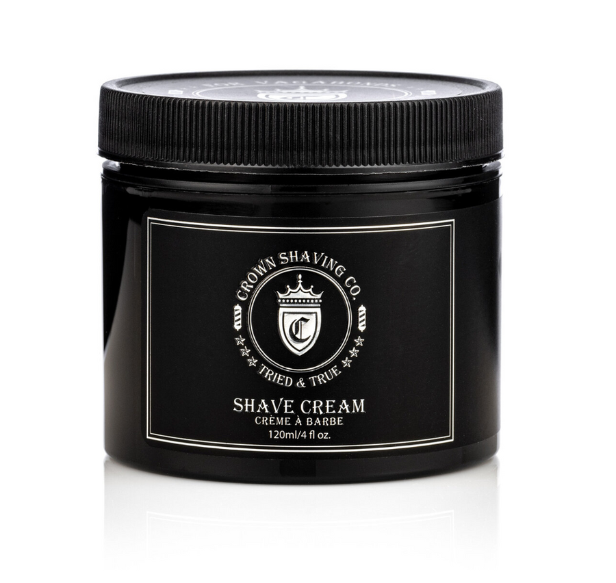 This image shows a black jar of Crown Shaving Co. Shave Cream with a black, ribbed lid. The label includes the brand's logo and the product name "SHAVE CREAM"